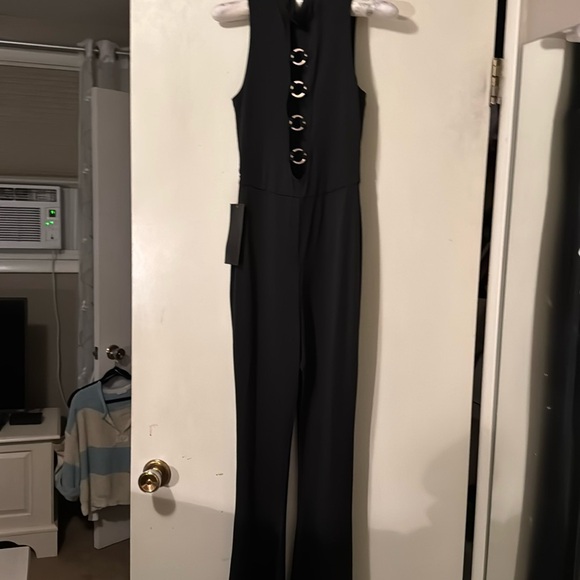 Bebe Black Sleeveless Jumpsuit with High Neckline & Ring Detail Sz XXS - Picture 7 of 9